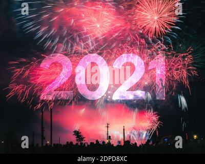 Happy new year 2021 card on a red fireworks background Stock Photo