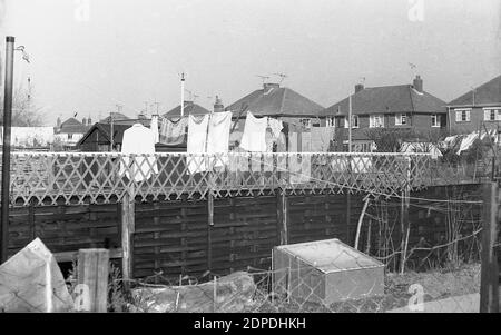 1950s, historical, washing hanging on a line outside in a suburban back garden, England, UK. Stock Photo