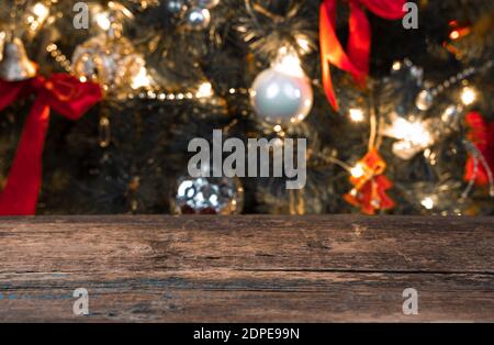 Blurry Christmas background with Christmas tree and lights. Stock Photo