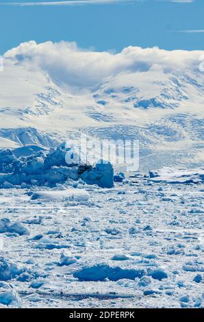 Glacial deep blue water of Antarctica can be seen on the point of the peninsula after a three day trip across the Drake Passage Stock Photo