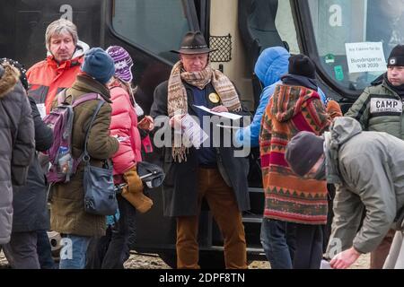 Munich, Bavaria, Germany. 19th Dec, 2020. As part of a poorly-organized and poorly-received 'Frauen Bustour'' (Womens' Bus Tour) through Germany, the group arrived at Munich's Theresienwiese to protest against the anti-Coronavirus measures, masks, and the German government. In attendance were Eva Rosen, Alexandra Motschmann (who states she is the sister of Biontech board member Michael Motschmann), 'Sandra Wpunkt'', and Janko W. The group has had incidents along the way, including being blocked from entry into at least one German state and then being escorted by police out of it Stock Photo