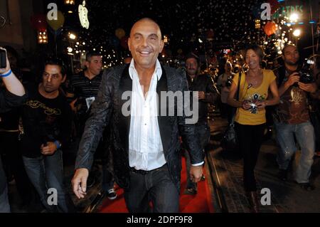 File photo Designer Christian Audigier hits the catwalk at the