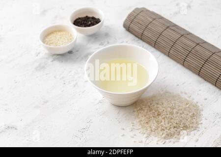 Composition with rice vinegar on table Stock Photo