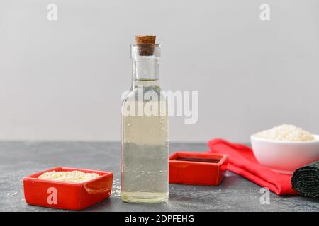 Composition with rice vinegar on table Stock Photo
