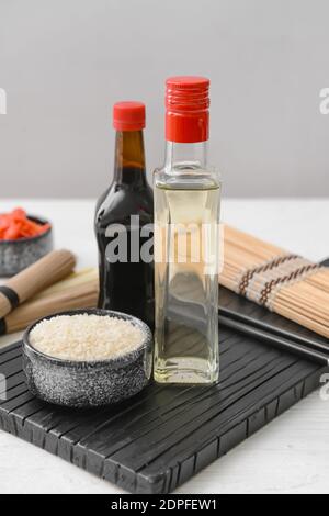 Composition with rice vinegar on table Stock Photo