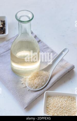 Composition with rice vinegar on table Stock Photo