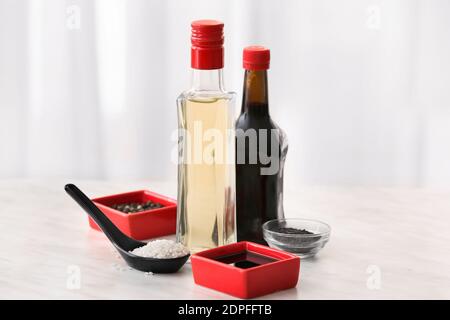 Composition with rice vinegar on table Stock Photo
