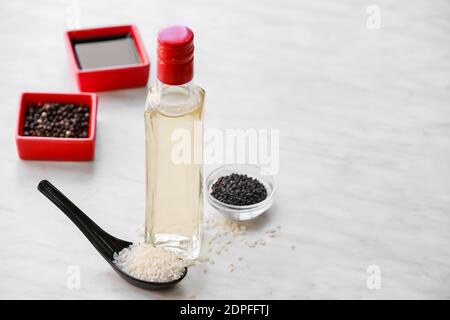 Composition with rice vinegar on table Stock Photo
