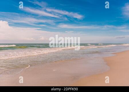 Waves gently caress the beach at St Petersburg Beach on Florida's Gulf Coast Stock Photo