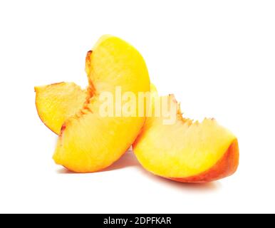 Pieces of ripe peach on white background Stock Photo