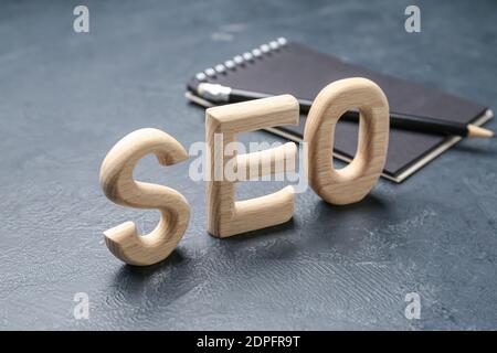 Abbreviation SEO on dark background Stock Photo