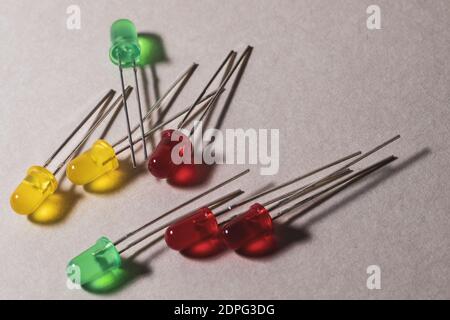 colored leds scattered on light background Stock Photo