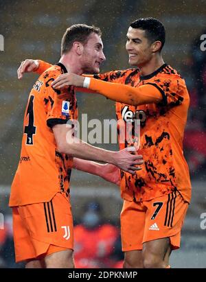 Parma, Italy. 19th Dec, 2020. FC Juventus' Dejan Kulusevski (L) celebrates his goal with Cristiano Ronaldo during a Serie A football match between Parma and FC Juventus in Parma, Italy, Dec. 19, 2020. Credit: Alberto Lingria/Xinhua/Alamy Live News Stock Photo