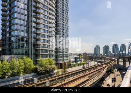 VANCOUVER, CANADA - APRIL 14, 2020: SkyTrain rapid transit system elevated rail road in downtown. Stock Photo