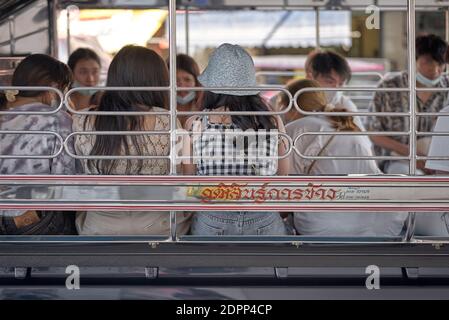 Thailand songthaew public transport taxi car fully loaded. Thailand S. E. Asia Stock Photo