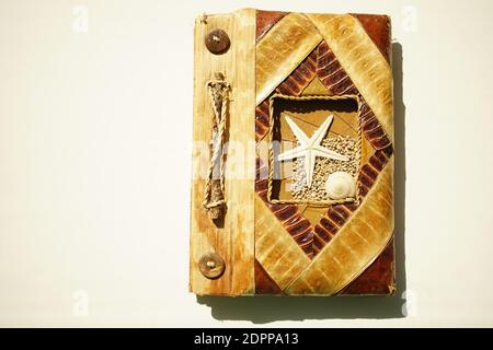 Notebook with natural design on cover in marine retro style. Stock Photo