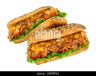 Slow cooked hog roast pork sandwiches in a multigrain topped bread roll with chunky Bramley apple sauce isolated on a white background Stock Photo