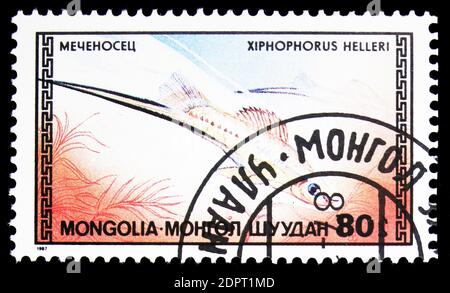 MOSCOW, RUSSIA - SEPTEMBER 26, 2018: A stamp printed in Mongolia shows Green Swordtail (Xiphophorus helleri), Tropical Fish serie, circa 1987 Stock Photo