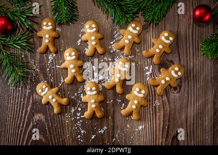 Selective focus. Christmas homemade gingerbread cookies on table. Happy New Year. Festive background. Top view.  Stock Photo