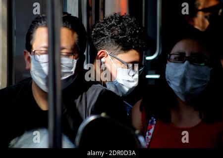 Non Exclusive: MEXICO CITY, MEXICO - DECEMBER 19: A person wears face mask while rides on the Mexican subway. People taken more drastic measures to pr Stock Photo