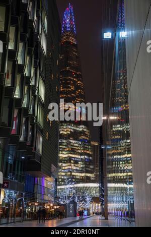 The Shard with special spire lights illuminating the London skyline. Stock Photo