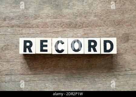 Alphabet letter block in word record on wood background Stock Photo