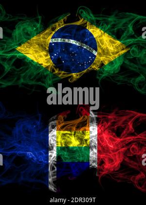 Brazil, Brazilian vs France Gay flag smoky mystic flags placed side by side. Thick colored silky abstract smoke flags. Stock Photo
