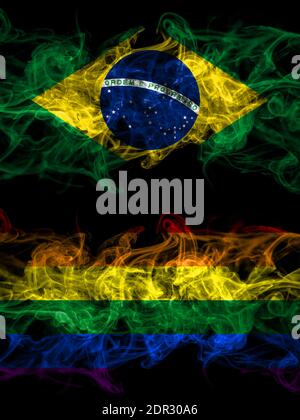Brazil, Brazilian vs Gay, Pride smoky mystic flags placed side by side. Thick colored silky abstract smoke flags. Stock Photo