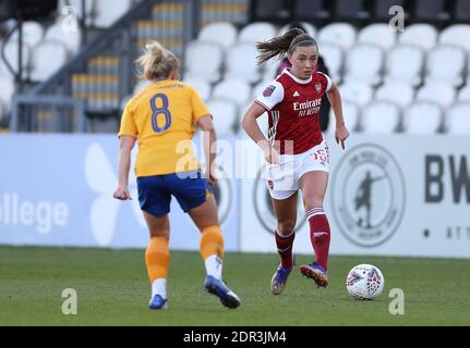 Everton's Izzy Christiansen (left) and Arsenal's Katie McCabe battle for the ball during the FA Women's Super League match at the Meadow Park, London. Stock Photo