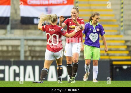 Leigh, UK. 20th Dec, 2020. Leah Galton (centre) celebrates with Kirsty Smith of Manchester United after scoring her sides first goal during the FA Women's Super League match at Leigh Sports Village, Leigh (Photo by Matt Wilkinson/Focus Images /Sipa USA) 20/12/2020 Credit: Sipa USA/Alamy Live News Stock Photo