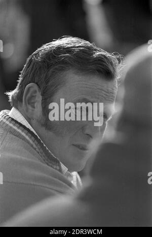 UK, England, Devonshire, Buckfastleigh, 1972. Point-to-Point races were held at  Dean Court on the Dean Marshes, close to the A38 between Plymouth and Exeter. A male spectator with fashionable sideburns. Stock Photo