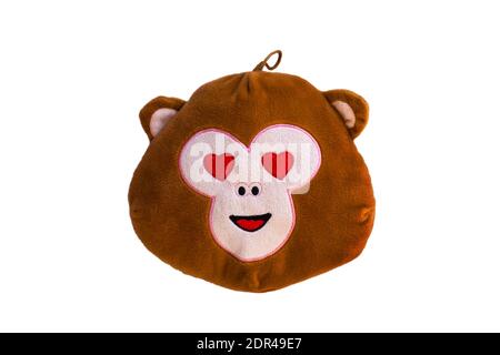 monkey emoji emoticon pillow cushion with heart eyes isolated on white background Stock Photo