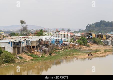 River Ikopa with riverside houses, Mandroseza, Antananarivo, Madagascar Stock Photo