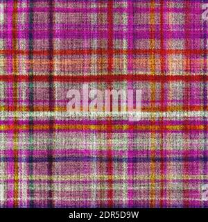 Variegated multicolor tapestry plaid woven texture. Space dyed watercolor effect knit check background. Fuzzy thin grungy textile material. Tufted Stock Photo