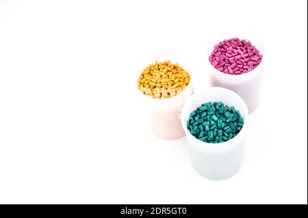 Plastic granules close up for holding,Colorful Plastic granules with white background. Stock Photo