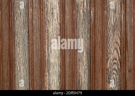Close-up of rustic wooden door in vintage style design with vertical wood grain Stock Photo