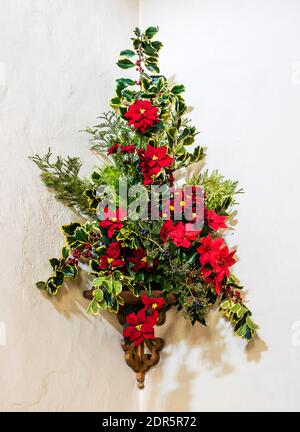 Christmas flower display at All Saints Church in East Budleigh. Stock Photo