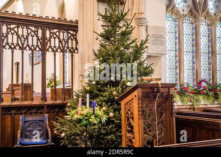 Christmas flower display at All Saints Church in East Budleigh. Stock Photo