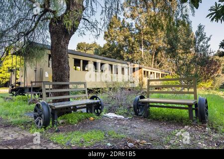 Benches with train wheels in the old abandoned Beirut train station, Mar Mikhael, Lebanon Stock Photo