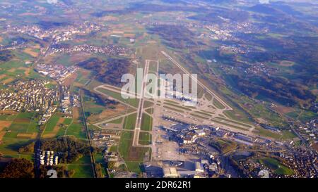 ZURICH, SWITZERLAND - 15th APRIL 2015: Aerial view of the multiple runways and terminals at Zurich international airport Stock Photo