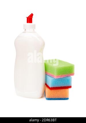 White dishwashing liquid in a transparent plastic bottle and three multicolored foam sponges isolated on white background. Kitchen detergent. Stock Photo