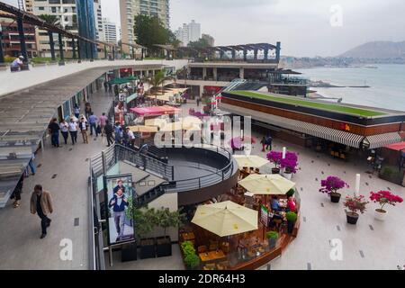 Lima, Peru - June 19, 2015: Shoppers walk around the Larcomar, a shopping center in Miraflores located on top of a reef with views of the Pacific Ocea Stock Photo