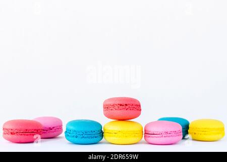 Colored macarons lined up on top of each other Stock Photo