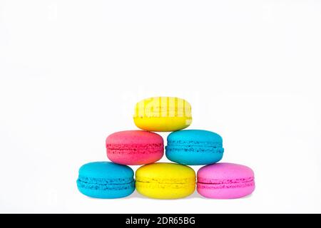 Colored macarons lined up on top of each other Stock Photo