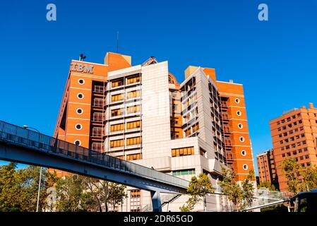 Madrid, Spain - Novemeber 10, 2020: IBM technology company headquarters in Madrid. View against blue sky Stock Photo