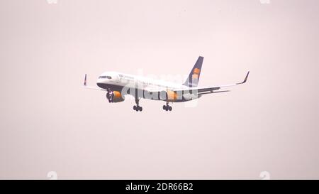 MUNICH, GERMANY - 11 OCTOBER 2015: Icelandair Boeing 757 with the aircraft registration TF-ISK in the approach to the southern runway of the Munich