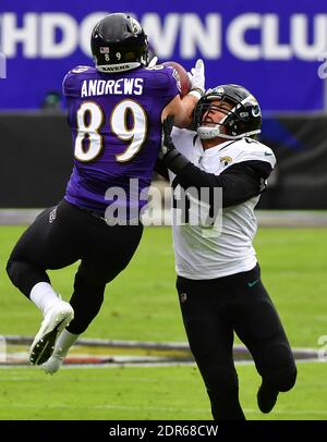 Baltimore, United States. 20th Dec, 2020. Baltimore Ravens tight end Mark Andrews (89) wrestles with Jacksonville Jaguars linebacker Joe Schobert (47) for a first down pass reception during the first half at M&T Bank Stadium in Baltimore, Maryland, on Sunday, December 20, 2020. Photo by David Tulis/UPI Credit: UPI/Alamy Live News Stock Photo