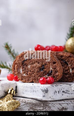 Christmas chocolate roll cake with cream Stock Photo