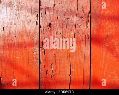 Texture of used wood planks painted red Stock Photo