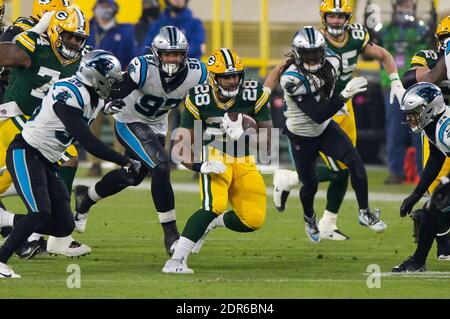 BALTIMORE, MD - DECEMBER 19: Packers running back A.J. Dillon (28) runs the  ball during the Green Bay Packers versus Baltimore Ravens NFL game at M&T  Bank Stadium on December 19, 2021